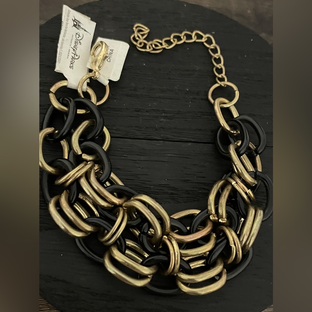 Disney parks gold tone and black link bracelet 7-10” NWT